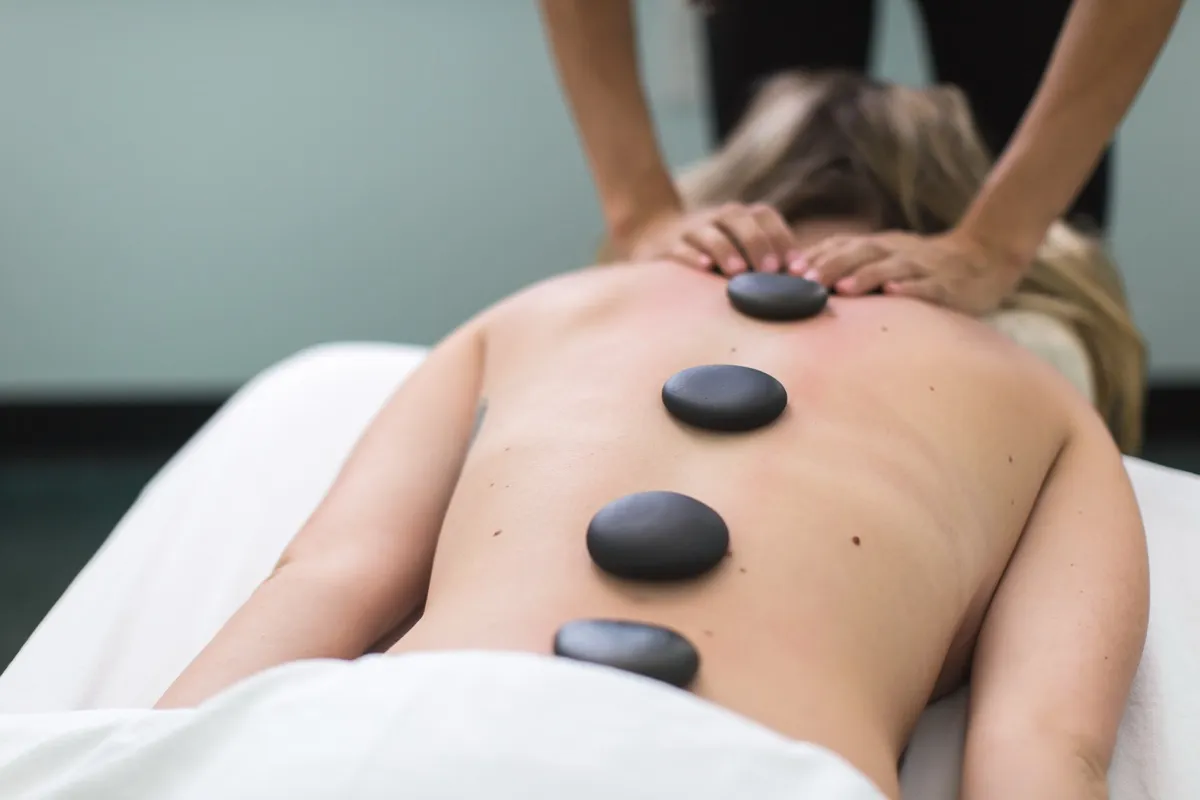 A hot stone recovery treatment at Temple Human Performance