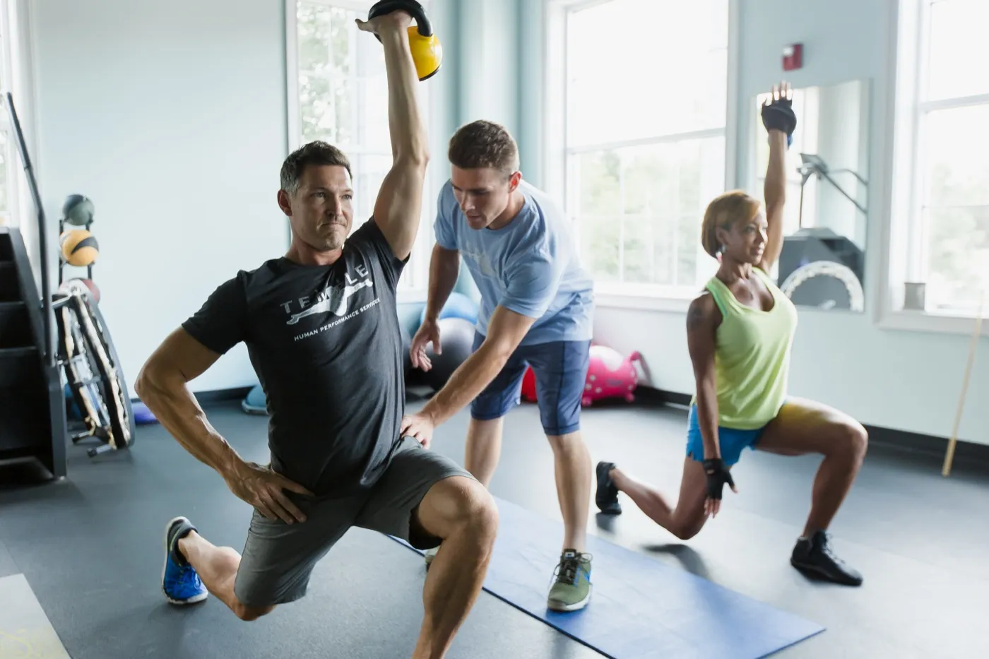 A Temple Human Performance therapist leading a group training session